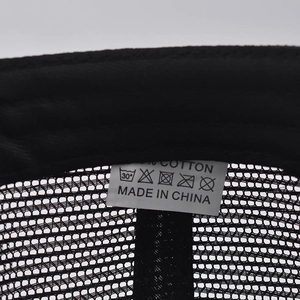 Close-up detail of the internal label showing 70% cotton material and care symbols