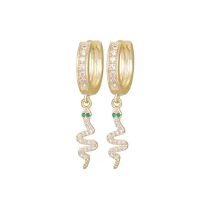 Elegant 18k gold plated snake drop earrings with white crystals and green stone eyes