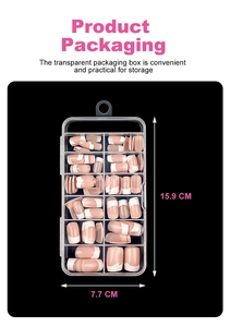 Detailed view of French-style nail tips in clear 12-grid organizer with size annotations