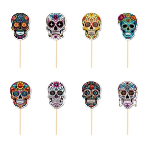 Set of 8 colorful Day of the Dead sugar skull cake toppers for Mexican party decor