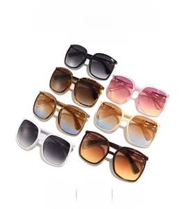 Detailed view of oversized square retro sunglasses in seven assorted stylish frame colors