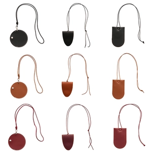 Faux leather heart and geometric sweater necklaces in black, brown, and burgundy