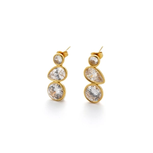 Vertical gold drop earrings featuring sparkling zircon gems in round and teardrop shapes