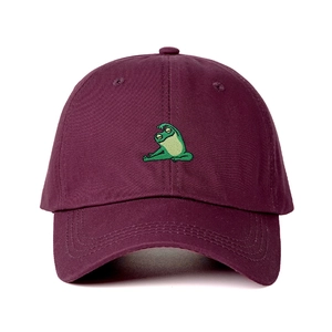 Vintage burgundy baseball cap featuring a green yoga frog embroidery and adjustable strap