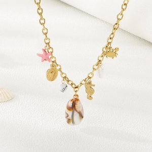 Golden stainless steel beach necklace with seahorse crab and natural shell charms