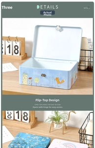 Detail view of the vintage tin storage box with a metal latch and fox illustration