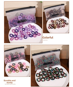 Detailed view of elastic mini hair ties in various colors with cute cartoon packaging