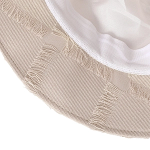 Beige woven bucket hat with trendy fringe edges and white lining for sun protection