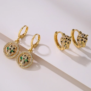 Exquisite gold-plated leopard head earrings with sparkling zircon stones and green accents