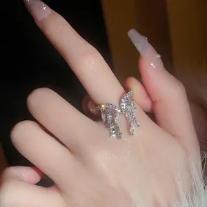 Elegant silver V-shaped zircon tassel ring with sparkling marquise cut stones for women