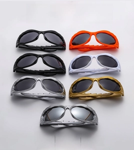 Collection of Y2K wraparound sunglasses in assorted colors with flame-shaped temple detail