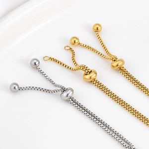 Adjustable stainless steel box chain bracelet with sliding bead closure in gold and silver