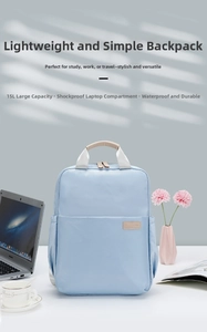 Light blue 15L laptop backpack featuring a shockproof compartment and waterproof fabric