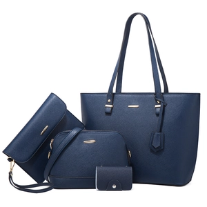 Navy blue 4-piece handbag set featuring tote, crossbody and clutch in crosshatch leather