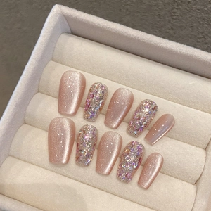 Pink cat eye press-on nails with glitter sequins in a coffin shape set of 10
