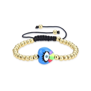 Handmade gold bead bracelet featuring a blue heart evil eye charm with rainbow stripes