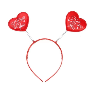 Detail view of red heart headband with I Love You lettering and flexible metal springs