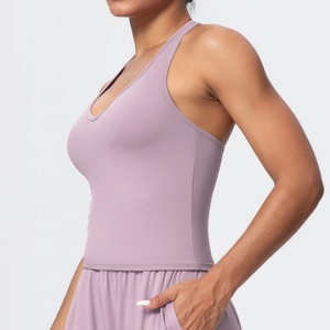 Detail view of the side pocket on the light purple high-waisted yoga leggings