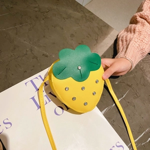 Cute yellow strawberry crossbody bag for girls with green leaf lid and silver sequins