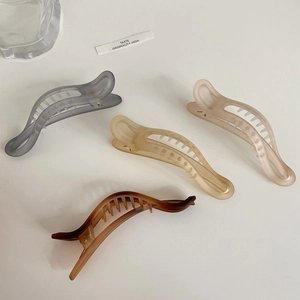 Four matte Morandi color large hair claws in grey, beige, pink and tortoiseshell finish