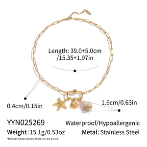 Detail of 18K gold plated stainless steel necklace with starfish and shell pendants