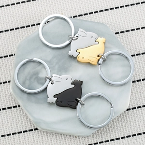 Cute cartoon interlocking rabbit stainless steel couple keychains in gold and silver finish