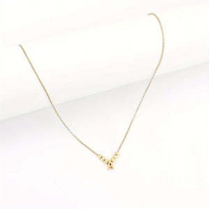 Minimalist gold letter A necklace with symmetrical metal beads on a delicate fine chain