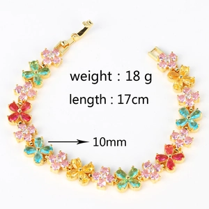 Bracelet trèfle à quatre feuilles coloré plaqué or avec pierres de zircone éclatantes