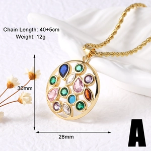 Macro detail of a 30mm gold hollow pendant necklace with multi-color crystal gemstones