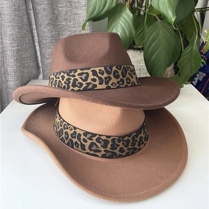 Detail showing wool felt fedora hats with leopard print bands in brown and camel