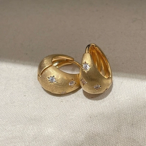 Brushed gold star earrings with zircon inlay and minimalist matte finish for women