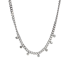 Close-up of silver Cuban chain necklace with seven round sparkling zircon pendants