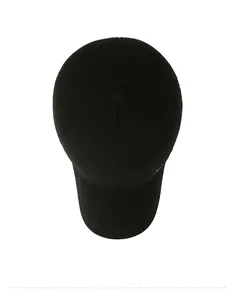 Top down view of black winter wool baseball cap showing six-panel structure and fabric texture
