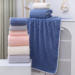 Absorbent coral fleece towel and bath towel set with soft striped texture in pastel colors
