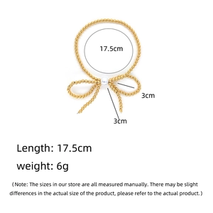 Minimalist 18K gold beaded bracelet with a pearl bow accent and 17.5cm length