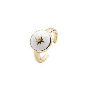 Detail of gold-plated star ring featuring white enamel inlay and adjustable open band