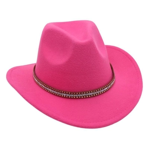 Close-up of bright pink felt cowboy hat with rhinestone-studded brown band detail