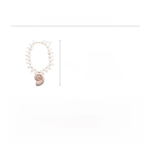 Detailed view of acrylic beads and vintage spiral conch shell pendant necklace