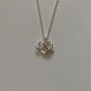 Minimalist 925 sterling silver heart knot pendant necklace on silver cross chain