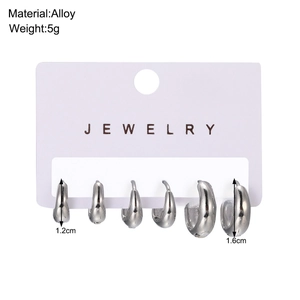 Set of three pairs of minimalist silver alloy C-shaped hoop earrings for women