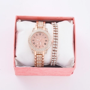 Close-up of rose gold crystal watch and matching bracelet in a pink gift box