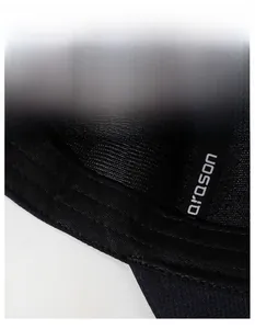 Detail of the moisture-wicking sweatband inside a black breathable baseball cap