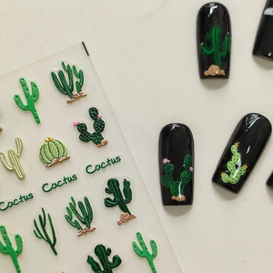 5D embossed cactus nail art stickers with 3D relief texture on black nail tips