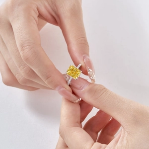 Macro shot of S925 silver ring featuring a large square yellow high-carbon diamond