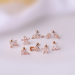 Set of 8 rose gold titanium steel stud earrings with cubic zirconia in various shapes