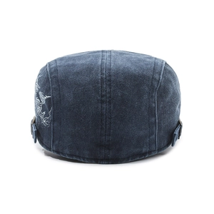 Vintage washed navy blue flat cap with dragon embroidery and adjustable metal buckle
