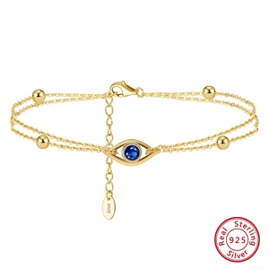 Double-layered 925 sterling silver evil eye bracelet with gold beads and lobster clasp