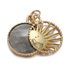 Detailed view of a gold-plated sun pendant with dark grey shell inlay for DIY jewelry