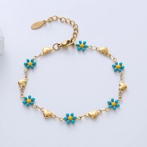 Elegant 18k gold plated stainless steel bracelet with blue flowers and heart charms