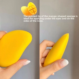 Detailed view of mango beauty sponge tip for precise eye and nose makeup application